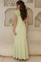Pistachio fitted dress with pleated chiffon sleeves and beaded bodice.