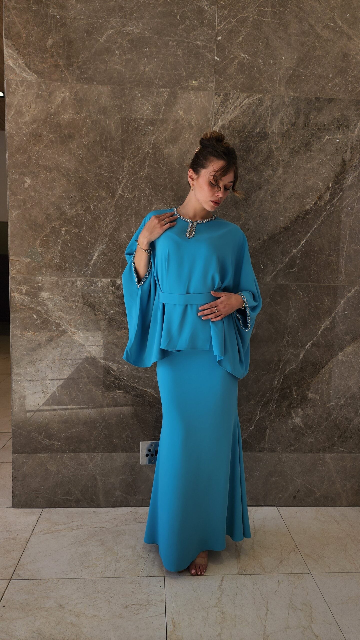 Exclusive Turqoise Two Piece Set with jeweled collar and belt.