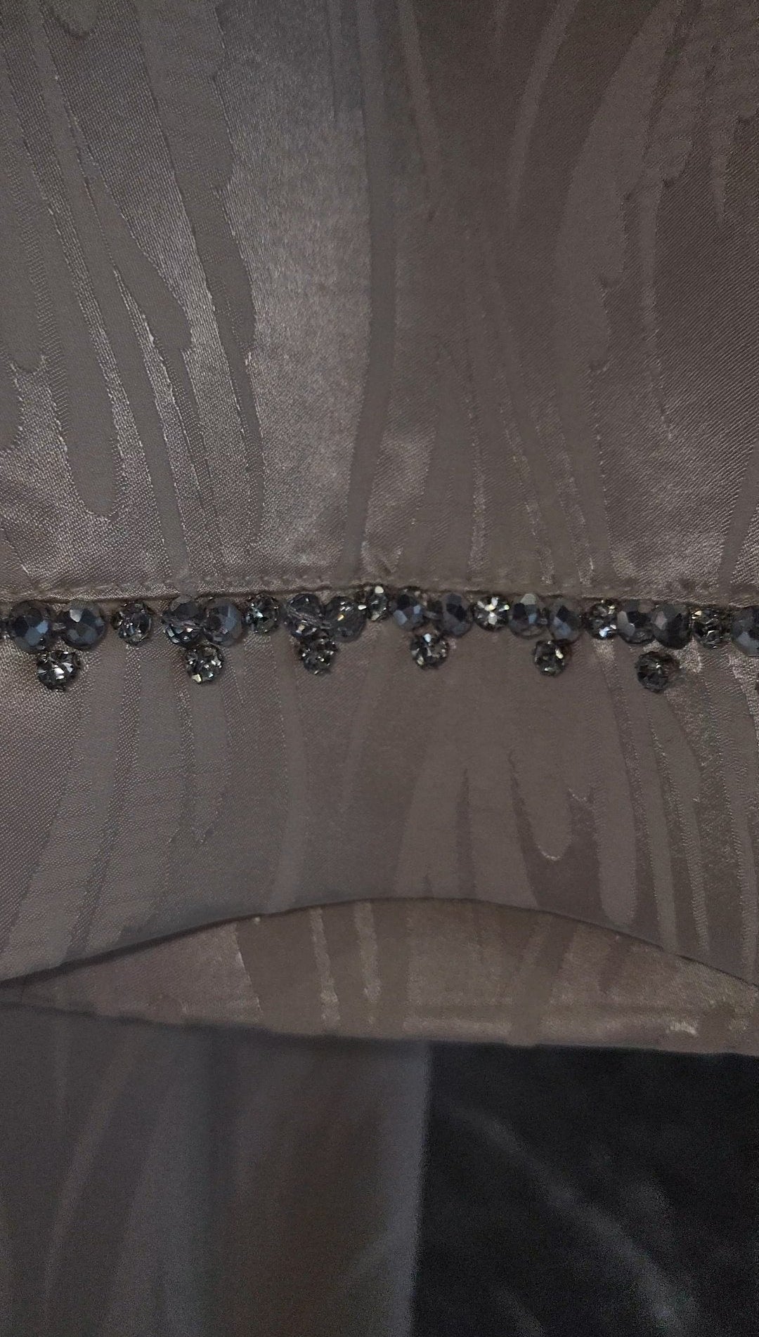 Exclusive Cream Silk satin dress with Beading on neckline and sleeve.