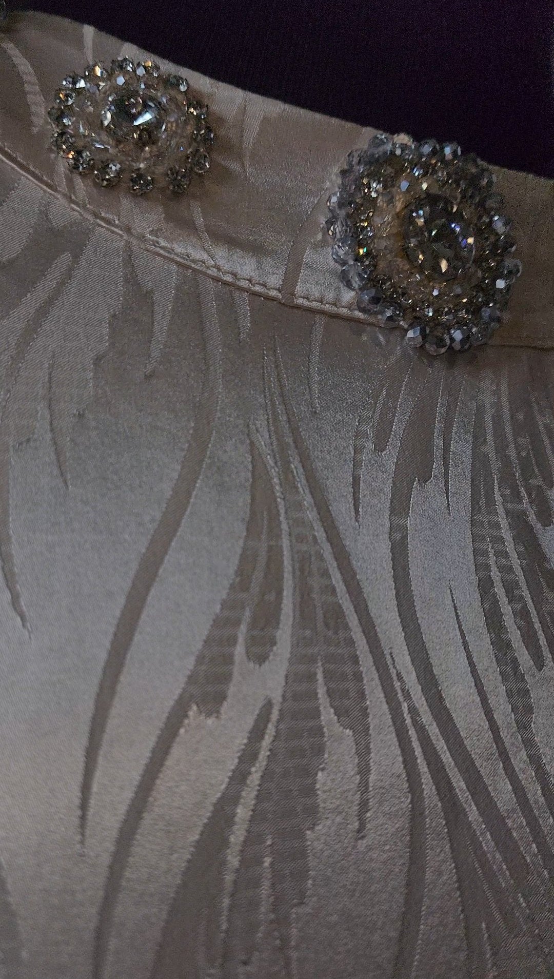 Exclusive Cream Silk satin dress with Beading on neckline and sleeve.