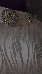 Exclusive Cream Silk satin dress with Beading on neckline and sleeve.