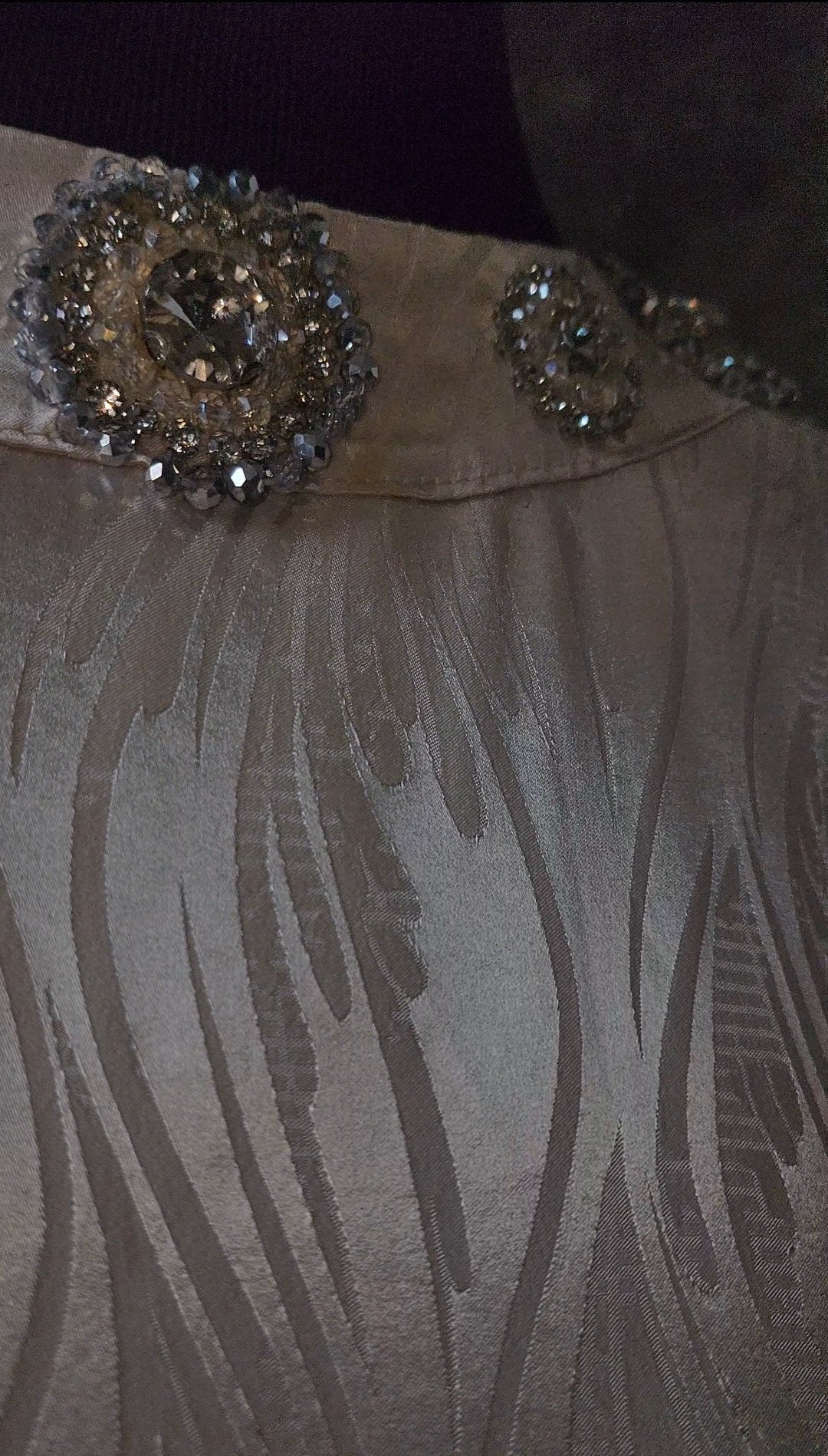 Exclusive Cream Silk satin dress with Beading on neckline and sleeve.