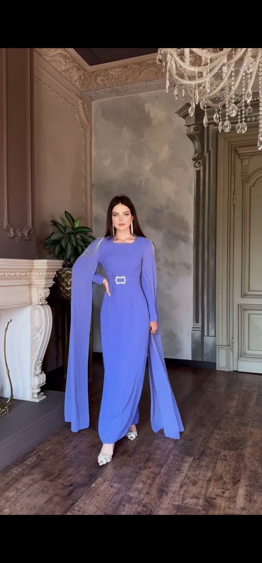 Exclusive Periwinkle Cape Sleeve Design Dress with jeweled belt and jeweled shoulder detail.