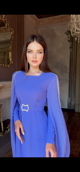 Exclusive Periwinkle Cape Sleeve Design Dress with jeweled belt and jeweled shoulder detail.