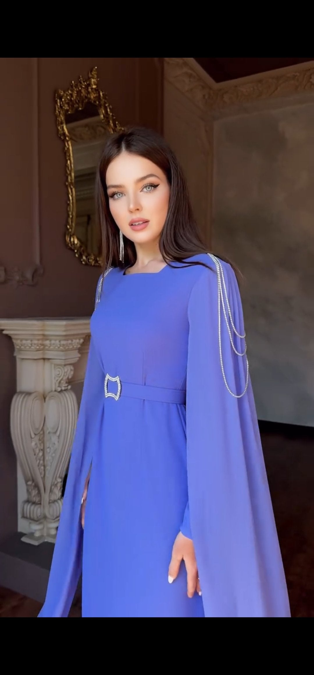 Exclusive Periwinkle Cape Sleeve Design Dress with jeweled belt and jeweled shoulder detail.