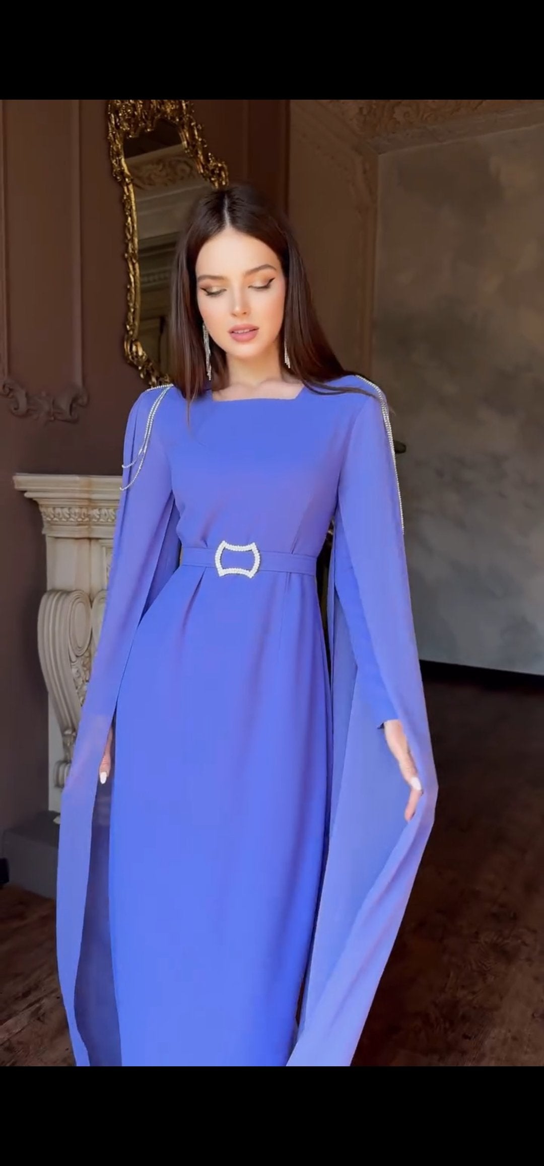 Exclusive Periwinkle Cape Sleeve Design Dress with jeweled belt and jeweled shoulder detail.