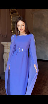 Exclusive Periwinkle Cape Sleeve Design Dress with jeweled belt and jeweled shoulder detail.