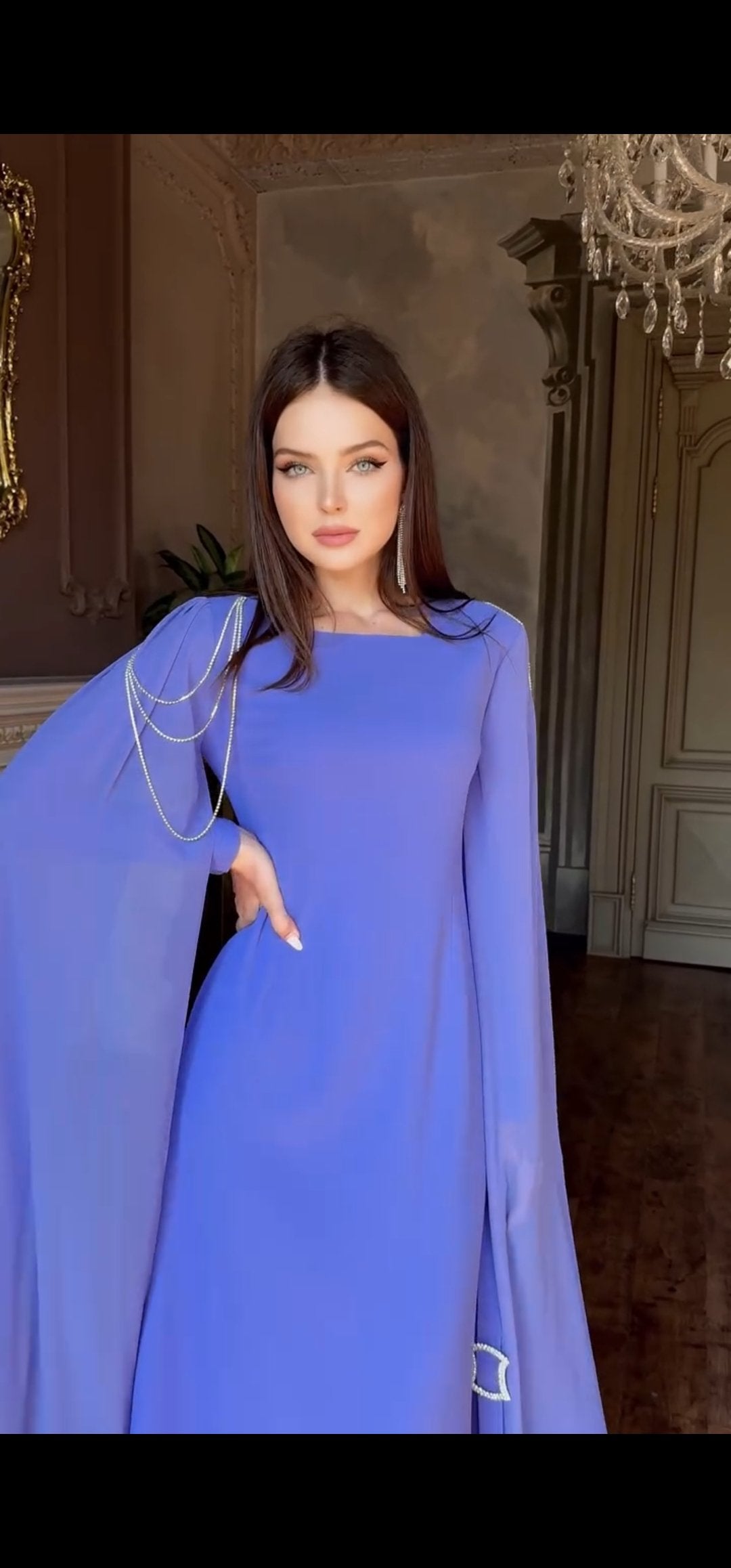 Exclusive Periwinkle Cape Sleeve Design Dress with jeweled belt and jeweled shoulder detail.