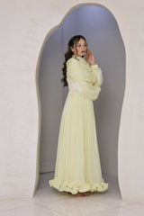Butter yellow chiffon pleated dress with rhinestone detailing.