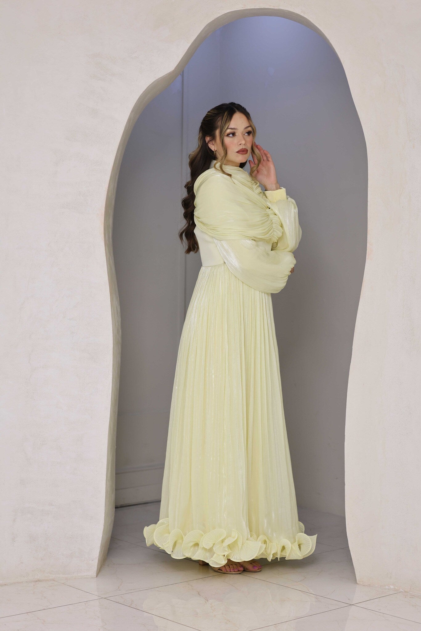 Butter yellow chiffon pleated dress with rhinestone detailing.