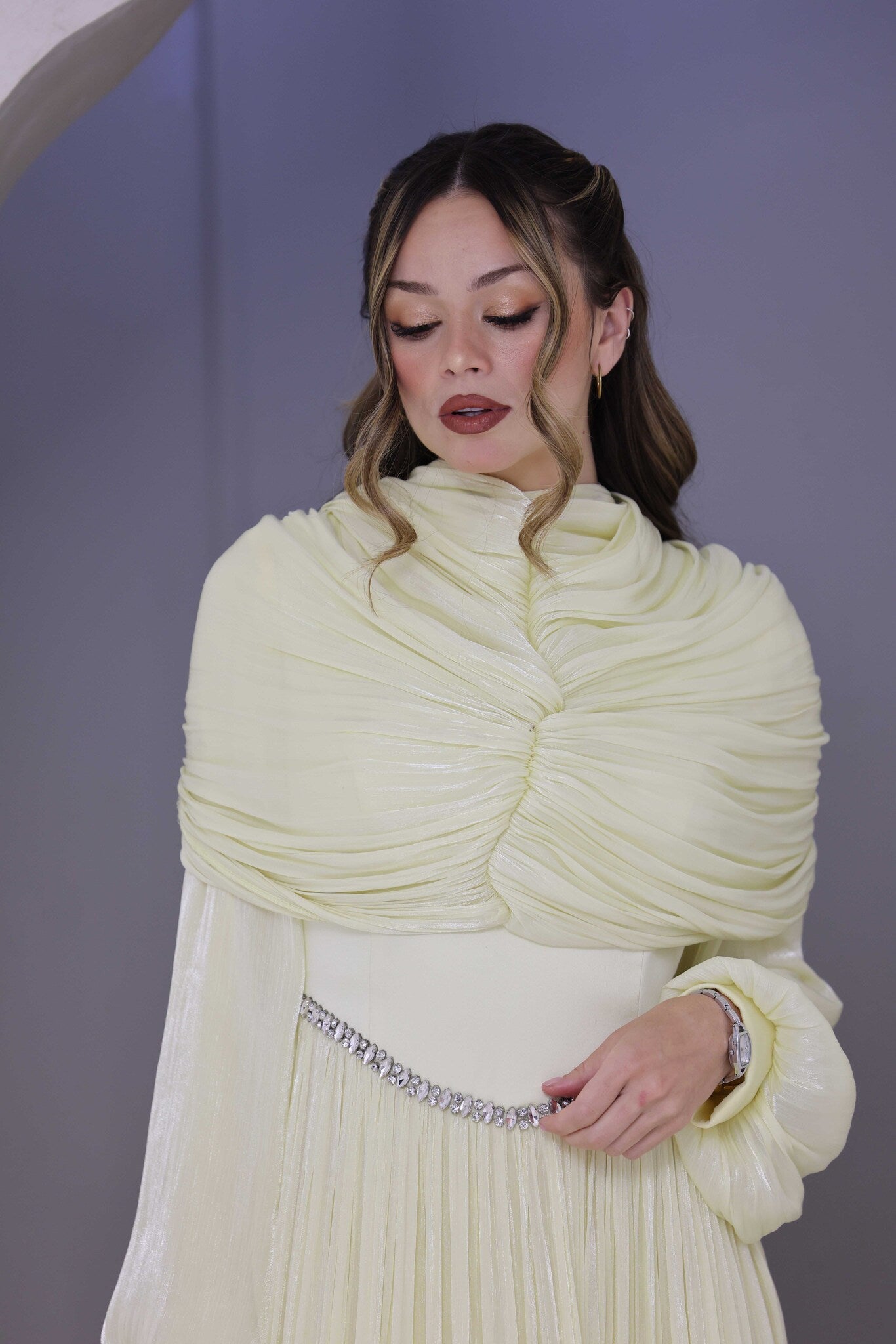 Butter yellow chiffon pleated dress with rhinestone detailing.