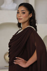 Full-length chocolate brown dress with rhinestone detailing on the neckline.