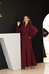 Burgundy dress with 3D floral hand-beaded appliqué on the bodice and sleeves.