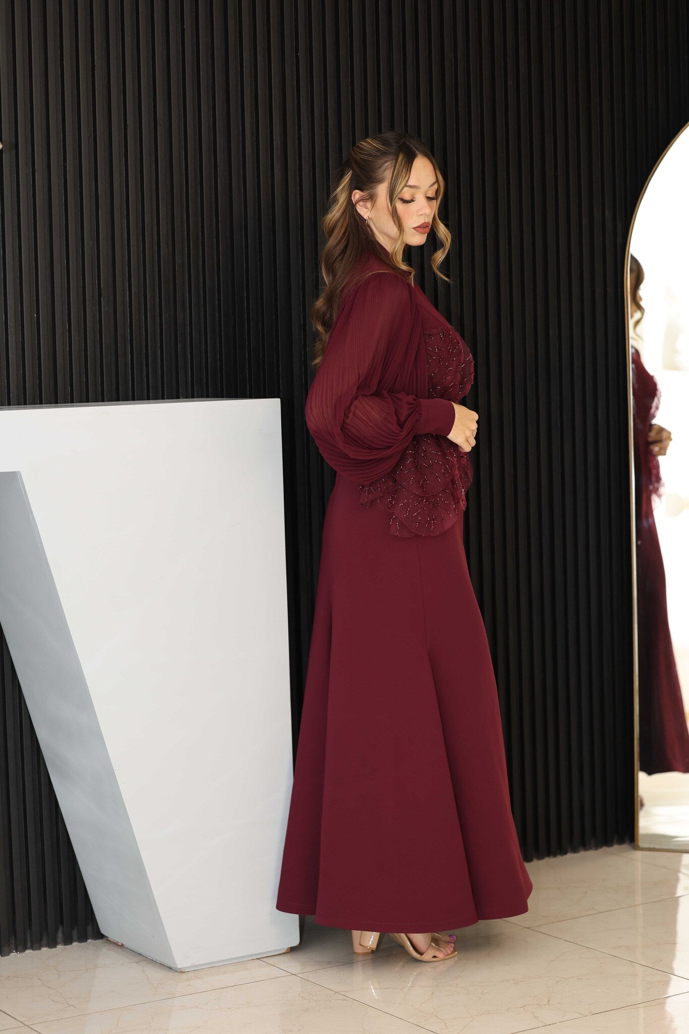 Burgundy dress with 3D floral hand-beaded appliqué on the bodice and sleeves.