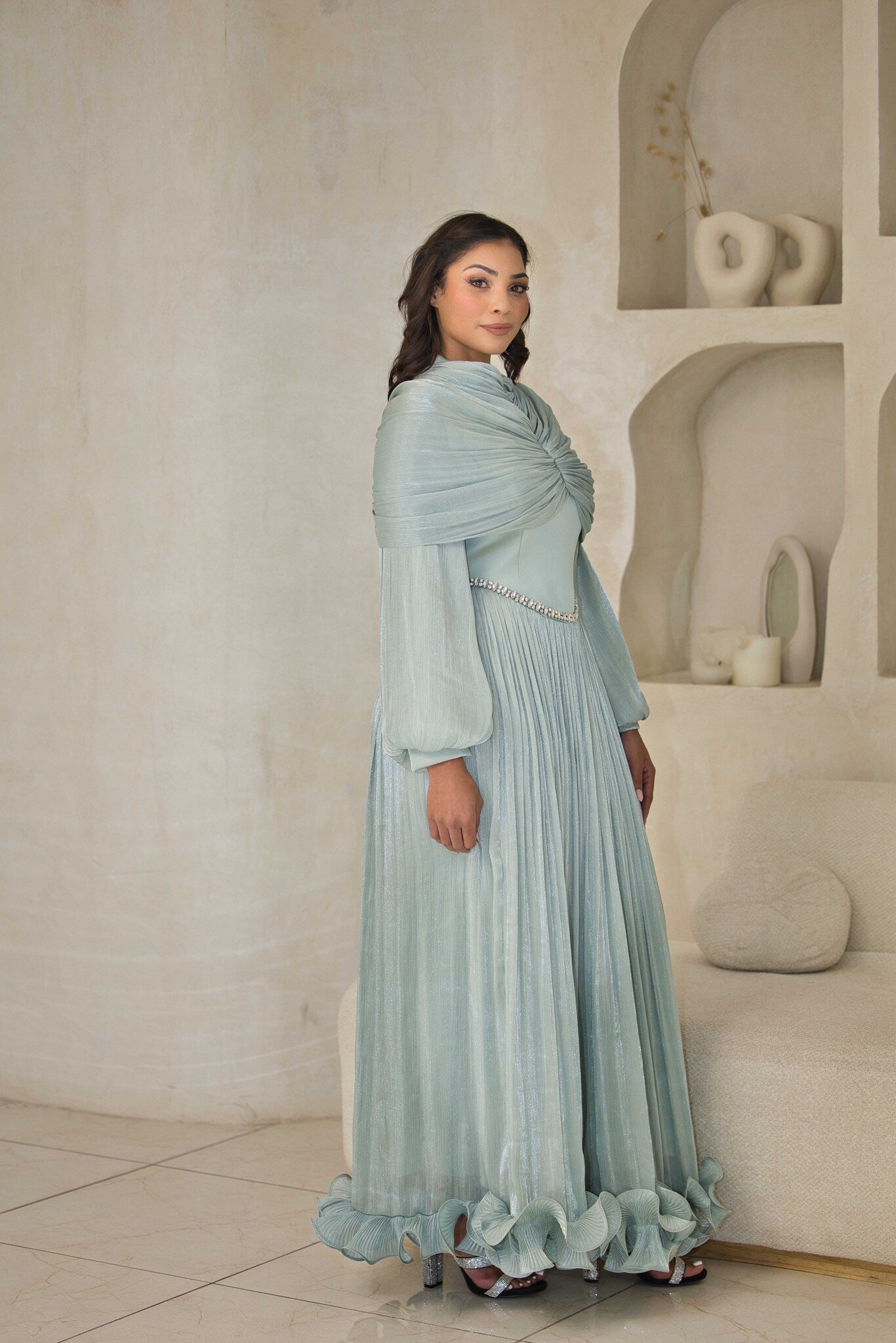 Mint green chiffon pleated dress with rhinestone detailing.
