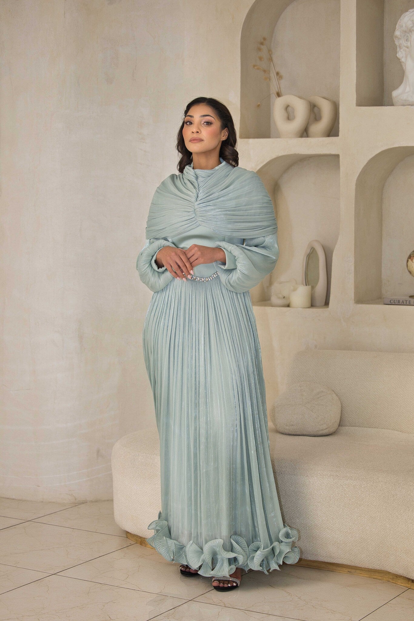 Mint green chiffon pleated dress with rhinestone detailing.
