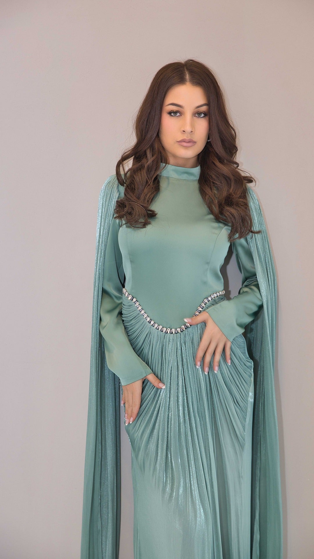 Exclusive Liquid Chiffon Cape Sleeve dress with Jewel detail on waistline