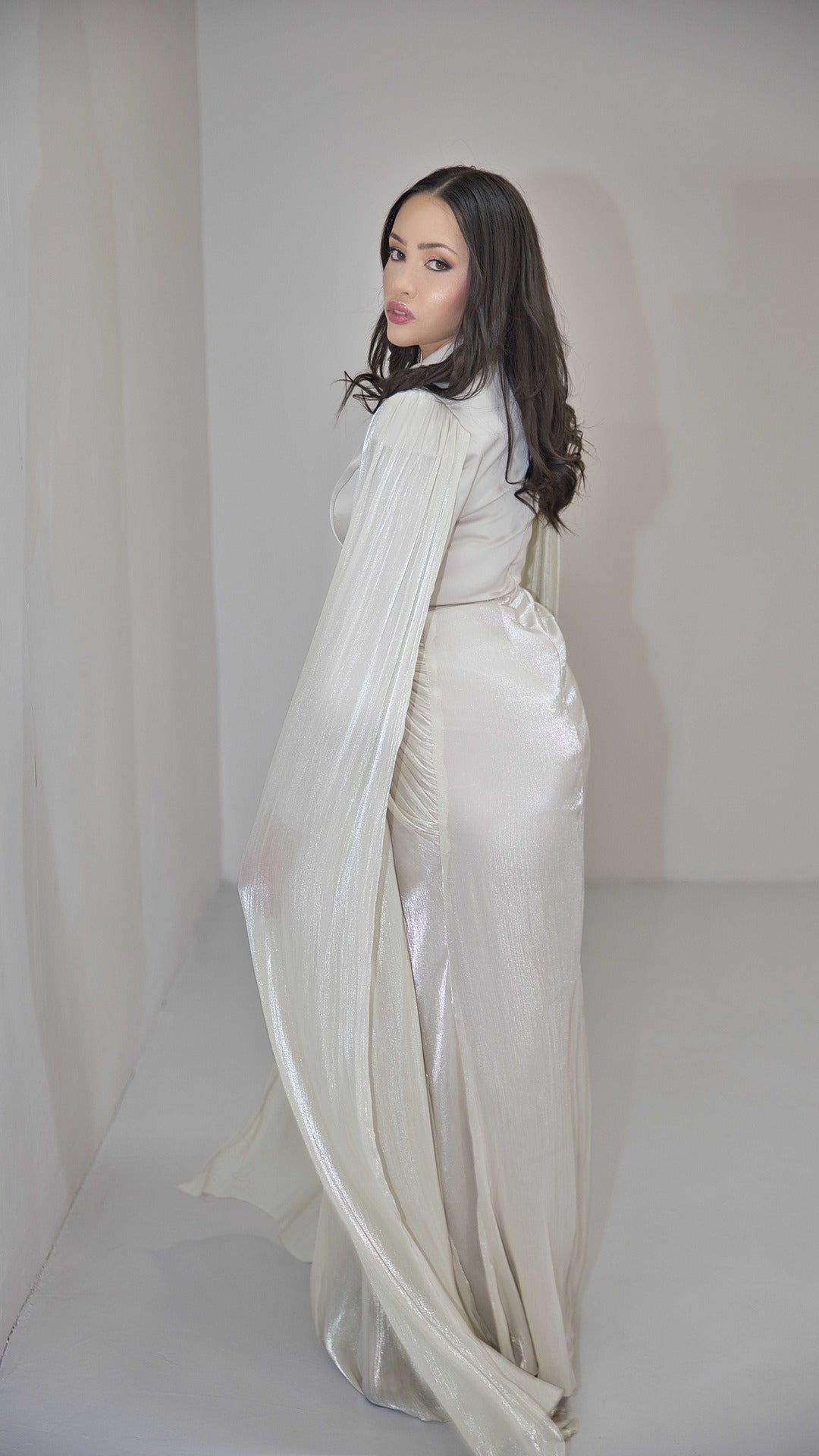 Exclusive Liquid Chiffon Cape Sleeve dress with Jewel detail on waistline