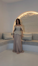 Exclusive Nude Peplum Dress with Crystal Detail.
