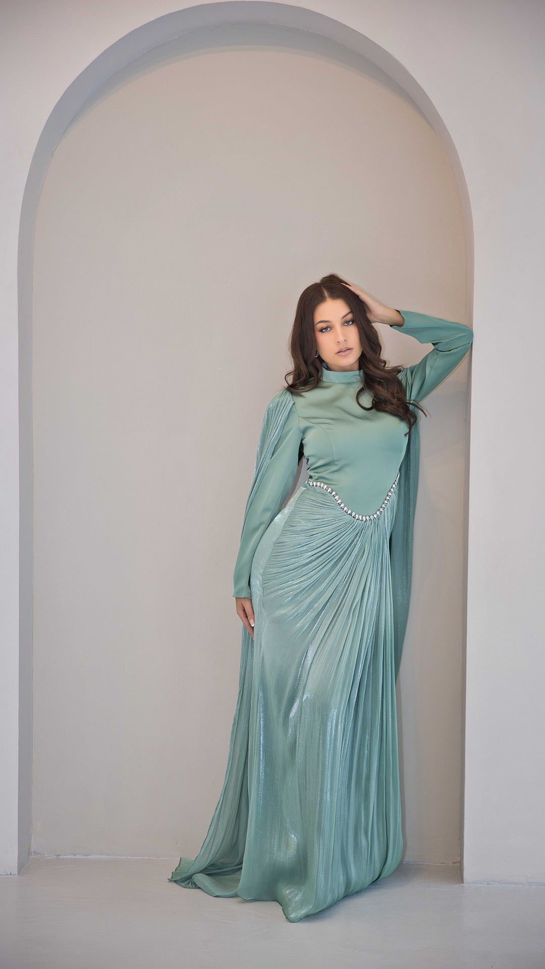Exclusive Liquid Chiffon Cape Sleeve dress with Jewel detail on waistline