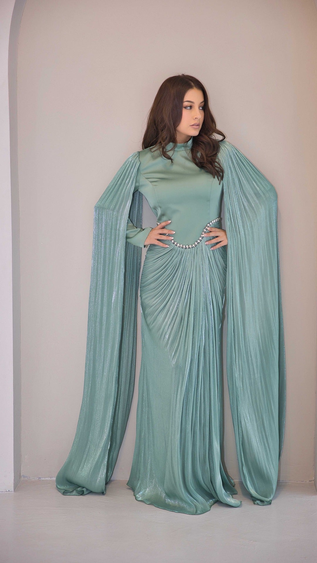 Exclusive Liquid Chiffon Cape Sleeve dress with Jewel detail on waistline