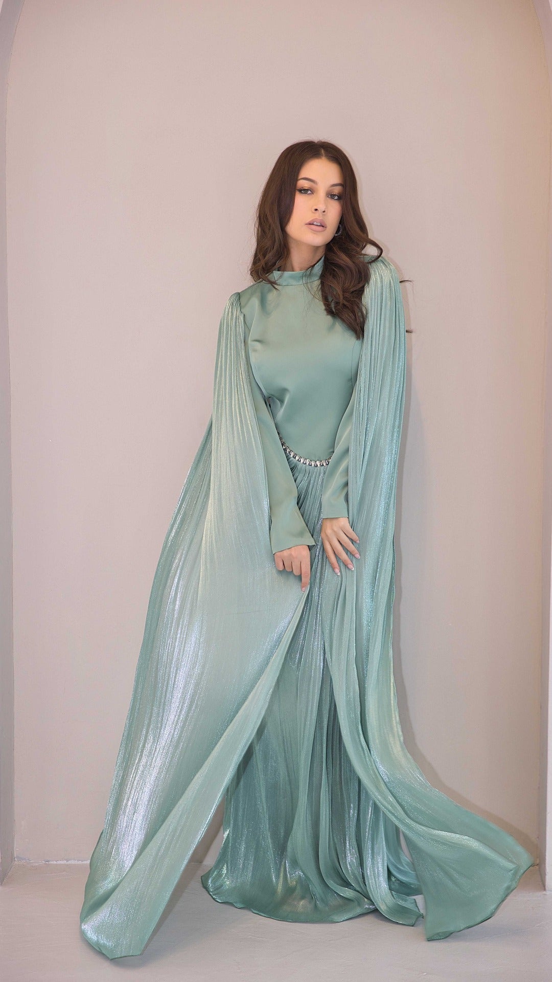 Exclusive Liquid Chiffon Cape Sleeve dress with Jewel detail on waistline