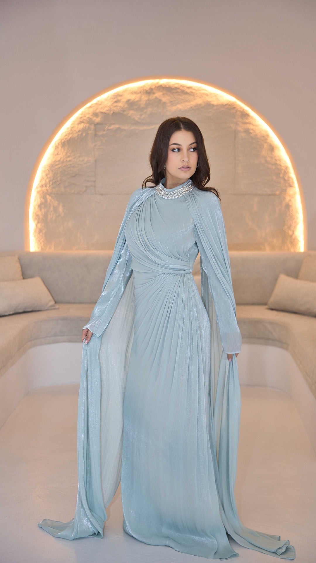 Exclusive Liquid Chiffon Mint Dress with beaded Neckline and Cape Sleeves.
